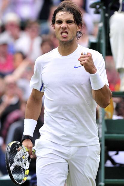 Rafael Nadal celebra su victoria sobre Gilles Muller.