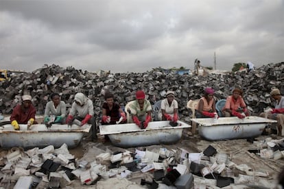 Recicladoras de plástico em Gana. Moleres tirou esta foto em 2010, quando começava a se interessar pelos efeitos da ação humana sobre o meio ambiente.