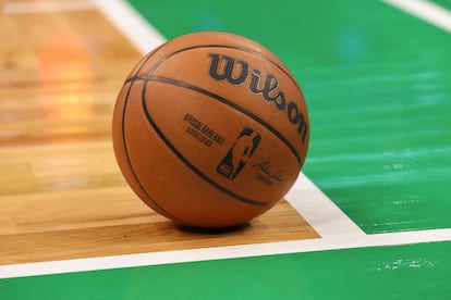 The official ball of the NBA, on the court of the Boston Celtics.