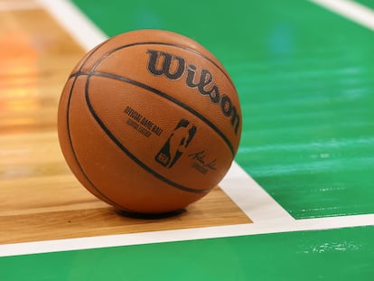 The official ball of the NBA, on the court of the Boston Celtics.