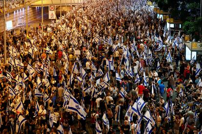 People take part in a demonstration against Israeli Prime Minister Benjamin Netanyahu and his nationalist coalition government's judicial overhaul, in Tel Aviv, Israel, July 22, 2023.