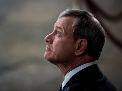 FILE PHOTO: Supreme Court Chief Justice of the United States John G. Roberts, Jr. waits for the arrival of Former president George H.W. Bush to lie in State at the U.S. Capitol Rotunda on Capitol Hill on Monday, Dec. 03, 2018 in Washington, DC. Jabin Botsford/Pool via Reuters/File Photo