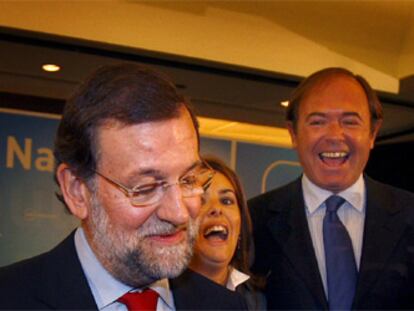 Mariano Rajoy, Soraya Sáenz de Santamaría y Pío García Escudero, tras el anuncio del líder del PP de proponerlos como portavoces en el Congreso y en el Senado, respectivamente.