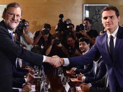 Mariano Rajoy y Albert Rivera, en agosto, cuando firmaron su pacto. 