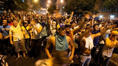 Opposition supporters hold a demonstration in Caracas on Monday night to demand a full recount of Sunday's presidential vote.