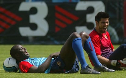 Thuram, junto a Víctor Valdés en un entrenamiento con el Barça.