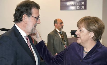 Mariano Rajoy and German chancellor Angela Merkel in December.