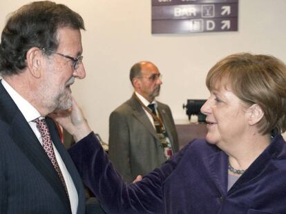 Mariano Rajoy and German chancellor Angela Merkel in December.