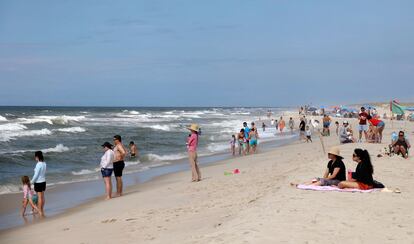 People are seen at Field 3 at Robert Moses State Park in West Islip, N.Y., Tuesday, July 4, 2023.