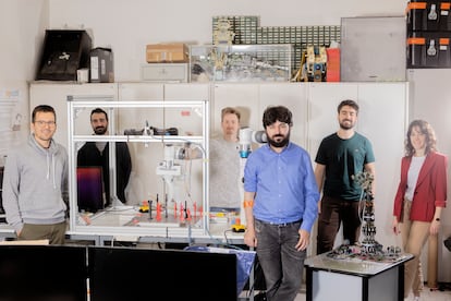 Part of the team working on the IntelliMan project in Bologna. On the right is researcher Alessandra Bernardini, who is working on the sensors that will provide the robots with a sense of touch. Third from right is assistant professor Roberto Meattini. 