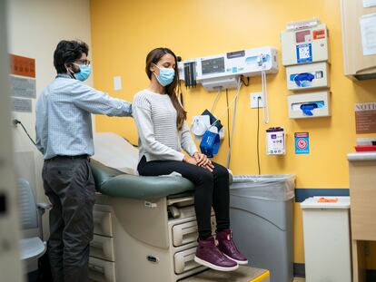 A doctor checks a patient at the Plaza del Sol Family Health Center in Queens, New York, in January 2024.