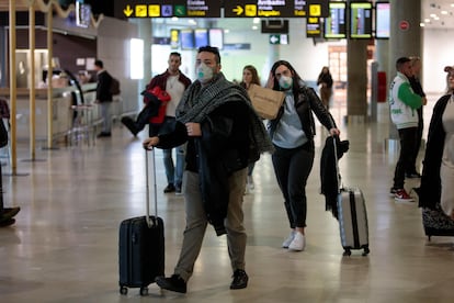 Travelers from Italy arrive in Manises airport in Valencia. 