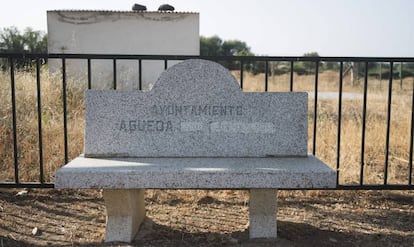 A bench shows how the village's former name, Agueda del caudillo, has been changed to just Agueda.