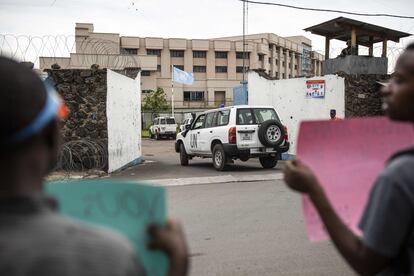 Members of LUCHA ("Lutte pour le changement", Struggle for change) protest in front of the UN peacekeeping mission in DR Congo MONUSCO compound in Goma on November 30, 2019, as failure of UN Peacekeepers to protect civilians from armed groups has led to protests in North Kivu over the past week.