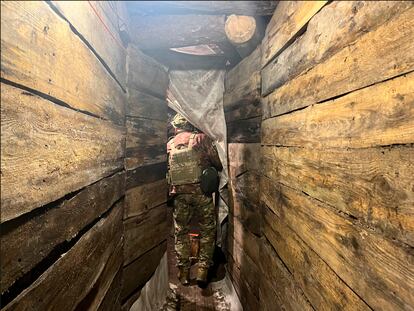 A soldier of the 40th Separate Rifle Brigade, in a trench on the Kupiansk front.
