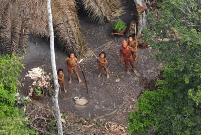 An isolated tribe in Brazil's Amazon jungle was photographed for the first time from a research helicopter.