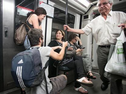 The new mayor of Barcelona, Ada Colau, takes the subway on Monday.