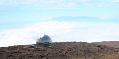 An artist's rendition of what the Thirty Meter Telescope would look like atop the Mauna Kea in Hawaii.