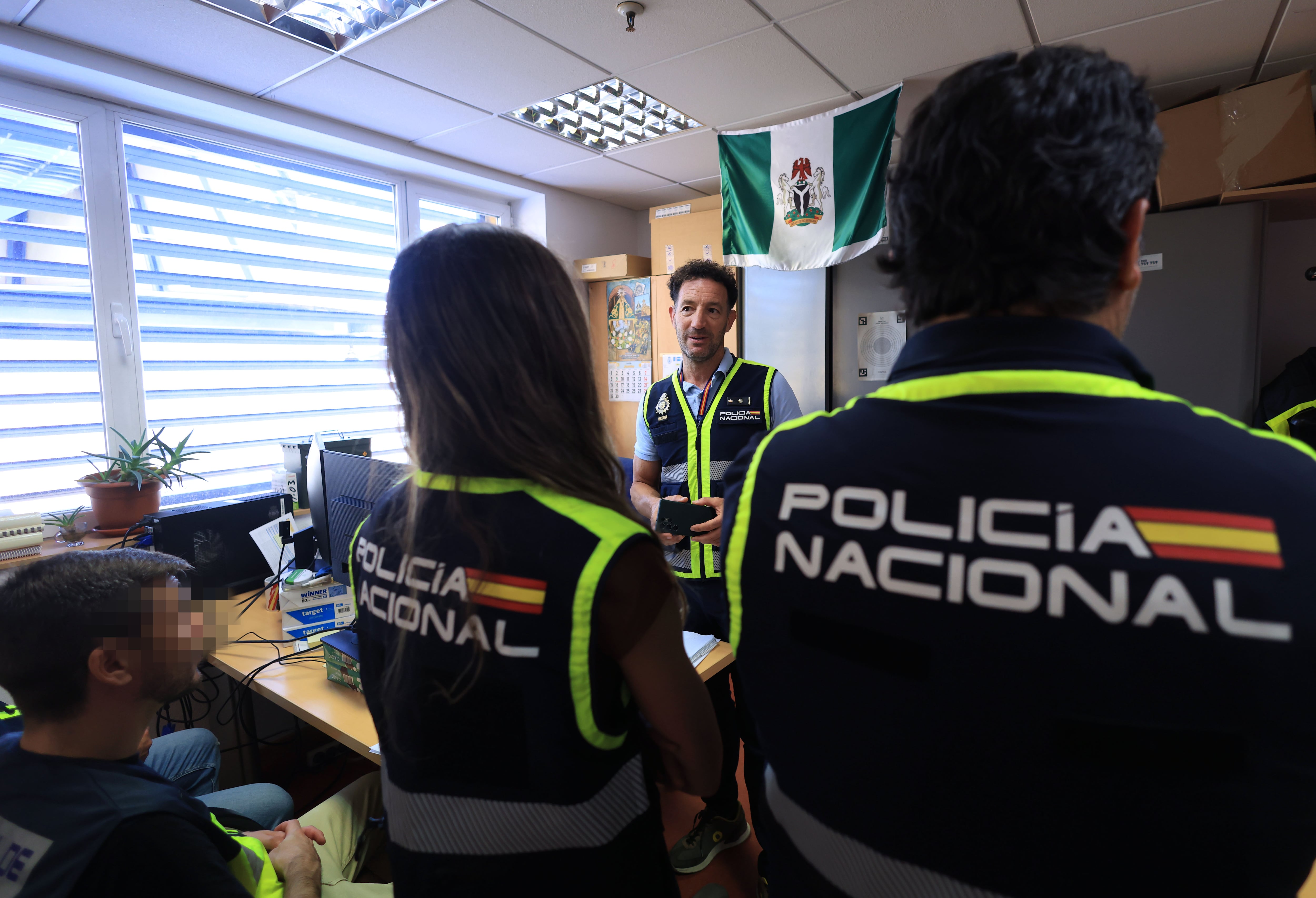Víctor de las Heras, chief inspector of the National Police unit that investigates the crime of trafficking in women, with part of his team.