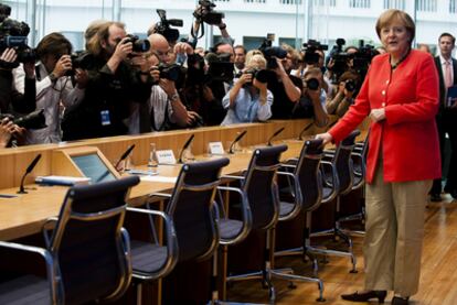 Angela Merkel, durante su comparecencia ayer ante los medios informativos.