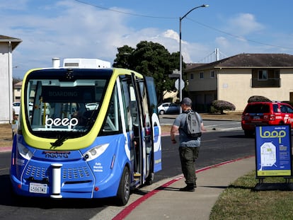A driverless shuttle stops for a passenger on San Francisco's Treasure Island on Aug. 16, 2023.