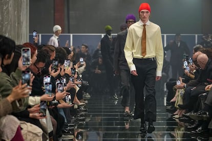 Models wear creations part of the men's Prada Fall-Winter 2024-2025 collection, that was presented in Milan, Italy, Sunday, Jan. 14, 2024.