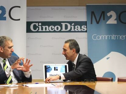 Javier de Miguel, socio de M2C, junto con Paul Salazar, vicepresidente de ventas y operaciones de Hazelcast.