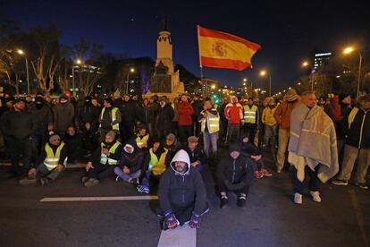 Taxi drivers sit at the Emilio Castelar roundabout next to the Paseo de la Castellana in Madrid.