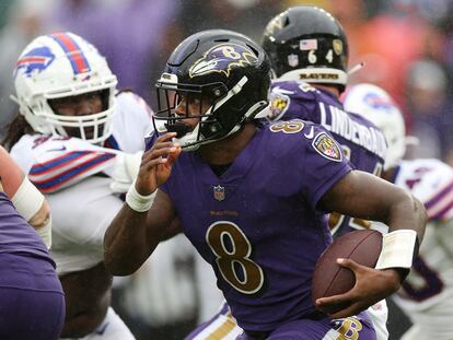 Lamar Jackson of the Baltimore Ravens runs with the ball in the fourth quarter against the Buffalo Bills at M&T Bank Stadium on October 02, 2022 in Baltimore, Maryland.