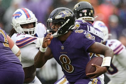 Lamar Jackson of the Baltimore Ravens runs with the ball in the fourth quarter against the Buffalo Bills at M&T Bank Stadium on October 02, 2022 in Baltimore, Maryland.