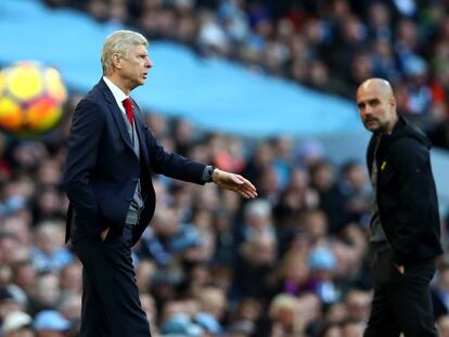 Arsene Wenger y Pep Guardiola. 