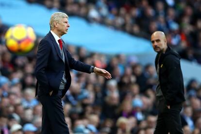 Arsene Wenger y Pep Guardiola. 