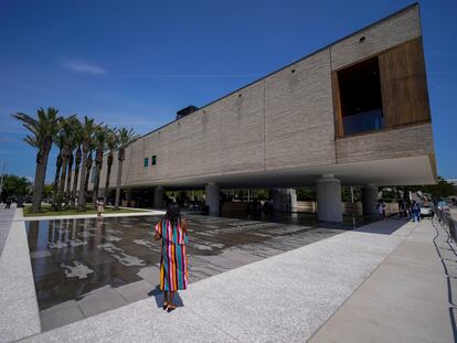 A visitor takes a picture at the opening of the International African American Museum on Saturday, June 24, 2023, in Charleston, S.C.