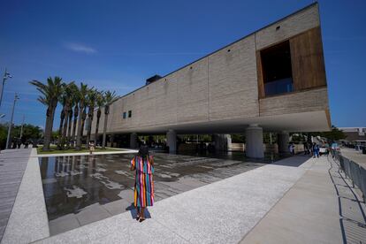 A visitor takes a picture at the opening of the International African American Museum on Saturday, June 24, 2023, in Charleston, S.C.