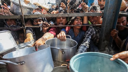 Palestinians trying to receive food from an aid distribution point in Khan Younis, Gaza, on June 05, 2025.