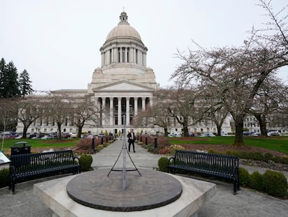 The sun dial near the Legislative Building is shown under cloudy skies, March 10, 2022, at the state Capitol in Olympia, Wash.