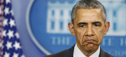 U.S. President Barack Obama reacts to question while speaking in the White House briefing room in Washington