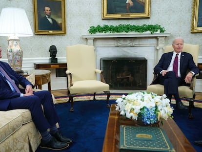 Speaker of the House Kevin McCarthy listens as President Joe Biden speaks before a meeting on the debt limit in the Oval Office of the White House, on May 9, 2023, in Washington.