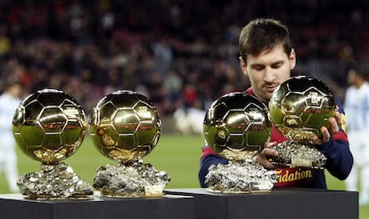Messi, con sus cuatro Balones de Oro.