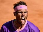 Spain's Rafael Nadal celebrates a point against Canada's Denis Shapovalov during their match of the Men's Italian Open at Foro Italico on May 13, 2021 in Rome, Italy. (Photo by Filippo MONTEFORTE / AFP)
