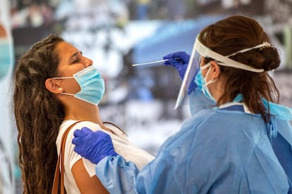 A young woman undergoing a PCR test in Palma de Mallorca, Spain.