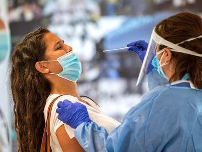 A young woman undergoing a PCR test in Palma de Mallorca, Spain.