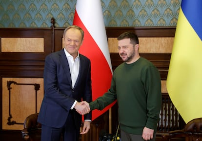 Ukrainian President Volodymyr Zelensky (R) shakes hands with Polish Prime Minister Donald Tusk (L) during their meeting in Kyiv, Ukraine, 22 January 2024.