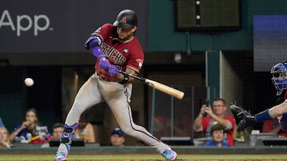 Arizona Diamondbacks second baseman Ketel Marte (4) hits a RBI double during the 2023 World Series against the Texas Rangers at Globe Life Field.