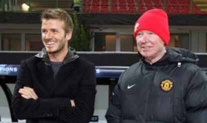 Alex Ferguson con David Beckham en 2009.