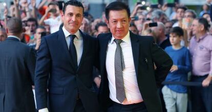 Peter Lim (d) junto a Amadeo Salvo en octubre de 2014.