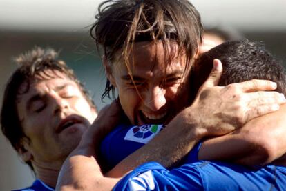 Bermejo, David Prieto y Armenteros celebran el primer gol del Xerez.