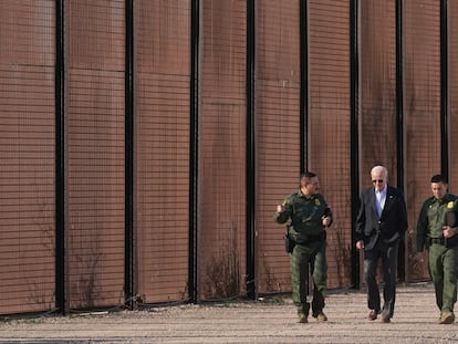 President Joe Biden walks with U.S. Border Patrol agents along a stretch of the U.S.-Mexico border in El Paso Texas, Sunday, Jan. 8, 2023.