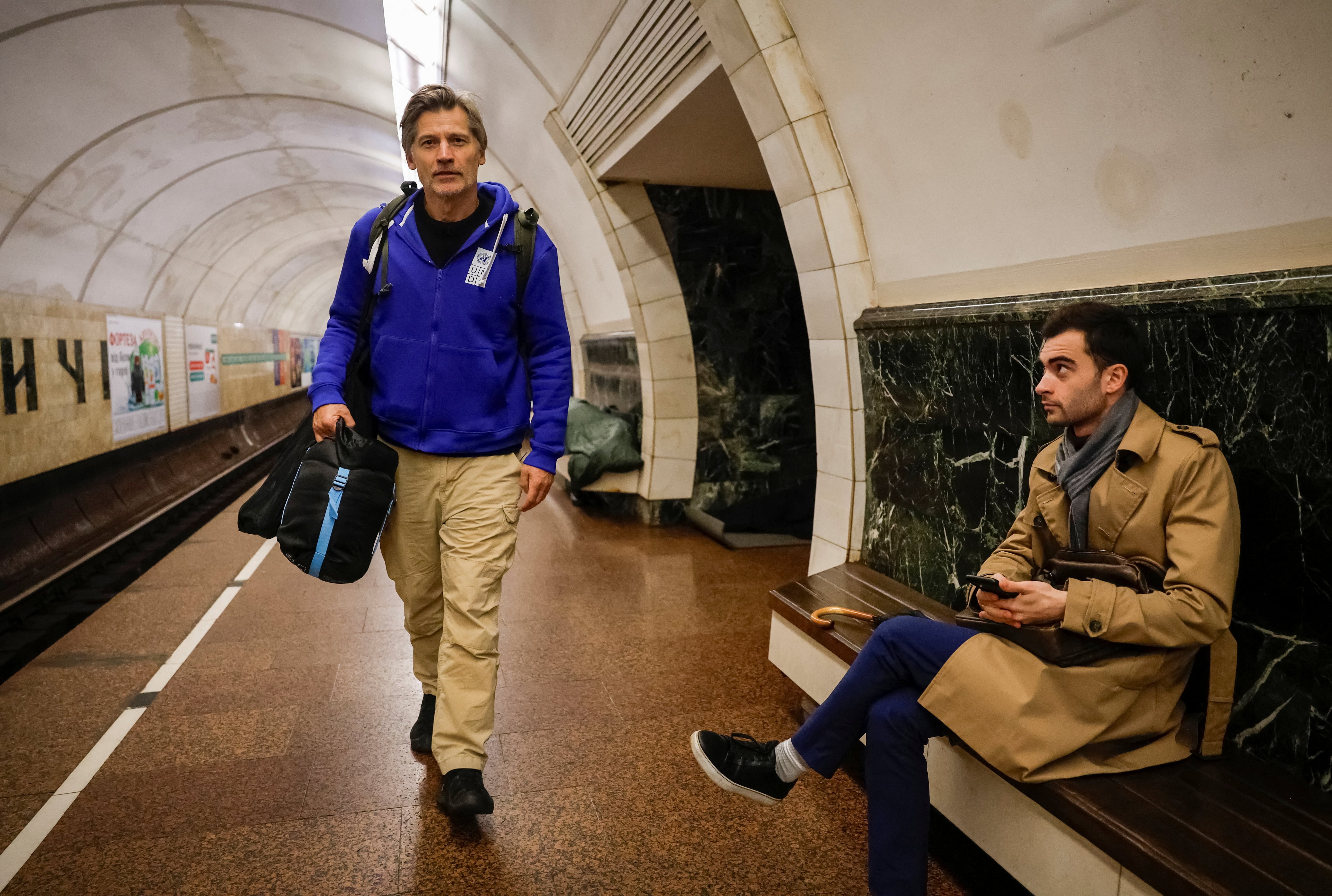 Actor Nikolaj Coster-Waldau takes shelter inside a metro station in Kyiv