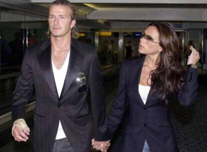 David Beckham, con su esposa, Victoria.